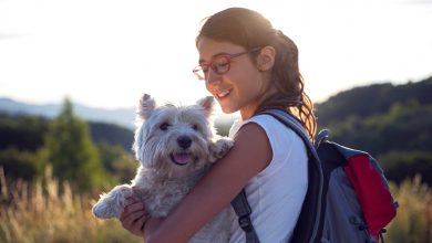 Woman holding Westie
